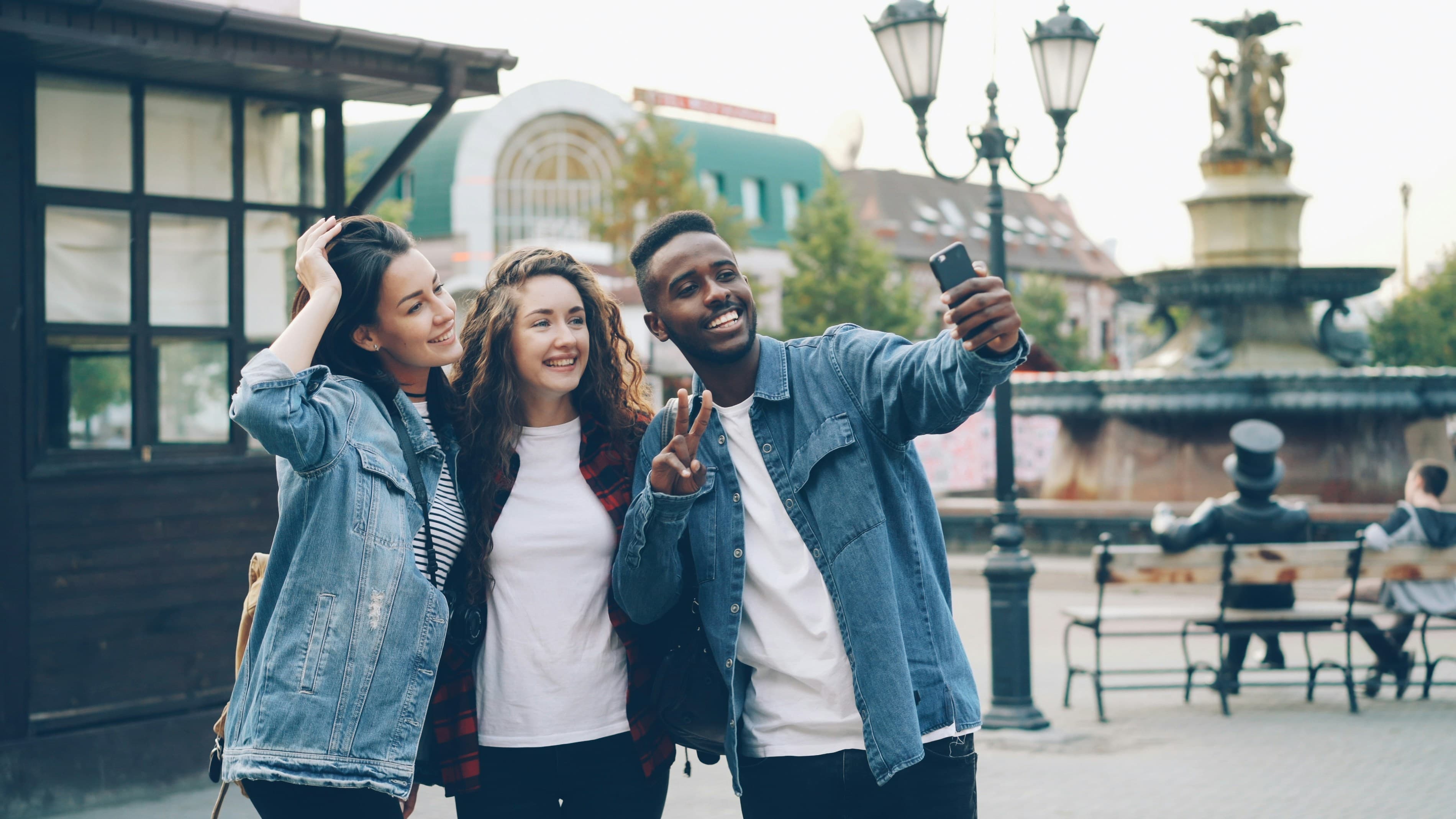Young adults connecting in a casual outdoor moment